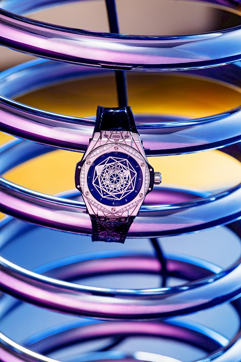 Hublot Big Bang One Click Sang Bleu on XL Spiral table lamp by Ingo Maurer, produced by Staff Leuchten