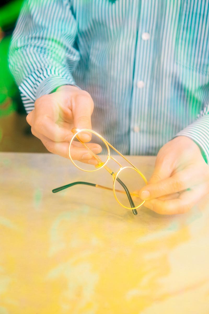 VIU store optician prepping the store window